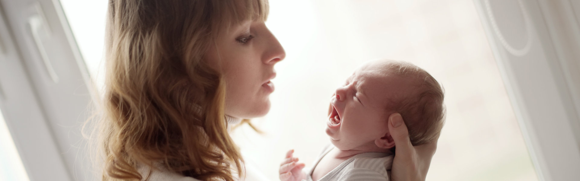 nurse holding a baby